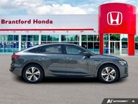 Command the road with sustainable power in this stunning Chronos Gray Metallic 2024 Audi Q8 e-tron S... (image 6)