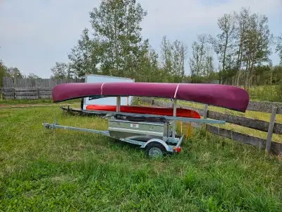 2018 - 16' four place canoe/kayak trailer with 2 - 60" aluminum boxes. Latches need some work. $2300...