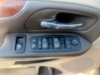 A spacious family minivan with comfortable seating, convenient features, and versatile cargo space,... (image 7)