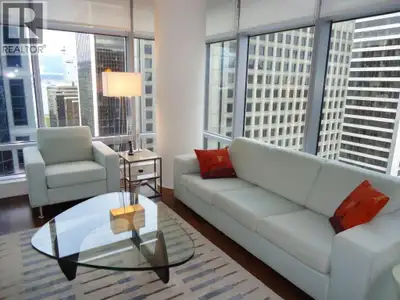This Downtown Vancouver furnished corporate rental at Shangri-La is a bright and contemporary 2 bedr...