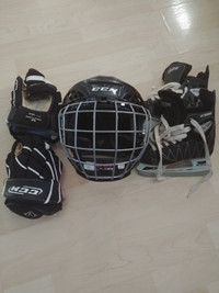 Ice hockey kit. Fits child age 7to9 years. Skates, helmet,gloves