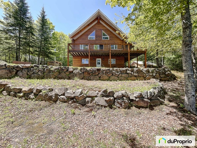 $975,000 - 1 1/2 Storey for sale in Trois-Rives — photo 1