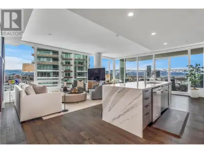 Experience unparalleled LUXURY in this stunning 14th-floor CORNER unit at One Water, BREATHTAKING PA...