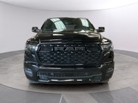 The 2026 Ram 1500 Big Horn 4x4 Crew Cab in a striking black exterior combines rugged durability with... (image 7)