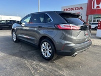 Seamlessly merge dynamic performance with premium comfort in the 2024 Ford Edge Titanium. Finished i... (image 6)