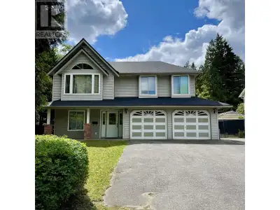 Solid 4 bedroom, 3 bathroom basement entry home with fantastic long-term investment value on a 8,625...