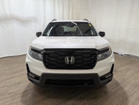 Experience the perfect blend of elegance and performance with the 2023 Honda Passport Touring AWD, d... (image 1)