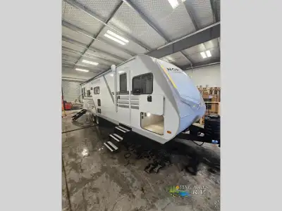 Heartland North Trail travel trailer 260MK highlights: Front Bedroom Two Entry Doors L-Shaped Kitche...