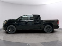 Introducing the 2026 Ram 1500 Sport 4x4 Crew Cab, beautifully styled in a Diamond Black Crystal Pear... (image 1)