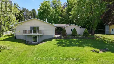 Set on over 3 acres with 350 feet of private shoreline, this rare waterfront property offers unmatch...