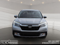 Fresh on the lot! This 2020 Honda Ridgeline Touring gives you the best of both worlds - the comfort... (image 1)