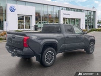 **Master any terrain with confidence** in this formidable 2024 Toyota Tacoma Crew Cab Pickup. With j... (image 4)