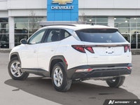 The 2023 Hyundai Tucson Preferred, featuring a brilliant Crystal White exterior complemented by a re... (image 3)
