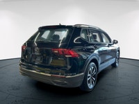 The 2024 Volkswagen Tiguan Trendline 4MOTION in black is an impressive AWD SUV that offers remarkabl... (image 4)