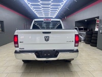 Get ready to own the roads with the stunning 2023 Ram 1500 Classic SLT 4x4 Crew Cab in a pristine wh... (image 7)