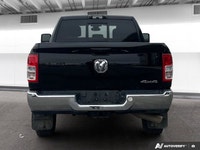 Experience *heavy-duty capability, rugged reliability, and work-ready performance* in this *2024 Ram... (image 4)