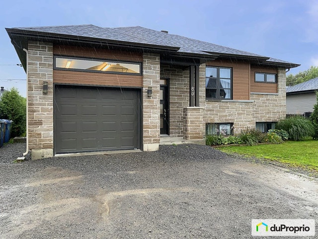 $559,000 - Bungalow for sale in St-Jacques — photo 1