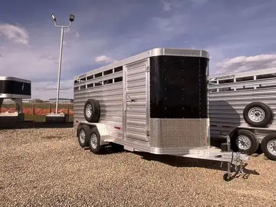 Compact, Durable & Safe Livestock HaulerHaul livestock safely and easily with the Featherlite Model...