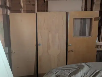 2 wood doors, one with window, View more