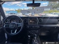 Unleash the spirit of adventure with the 2020 Jeep Wrangler Unlimited Sahara in striking Bright Whit... (image 9)