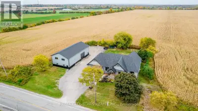 Stunning! Prepare to be wowed by this 4yr new 2,697 sqft bungalow. Country living a stones throw fro...