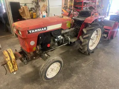 Yanmar diesel , 2 cylinder with 3 pth and a 44 inch tiller