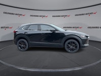 // ACCIDENT FREE!! // Finished in Black with a Burgundy interior, this used 2022 Mazda CX-30 GT w/Tu... (image 8)