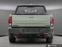 The 2026 Honda Ridgeline TrailSport in striking black with an AWD drivetrain offers unbeatable handl... (image 4)
