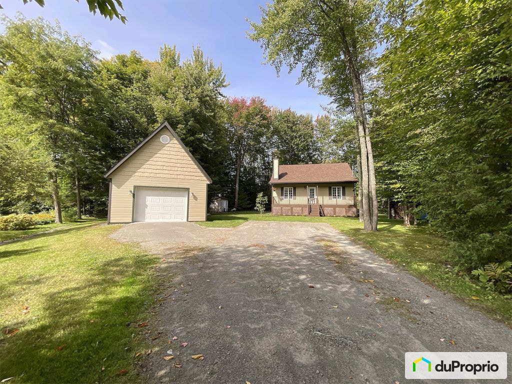 $696,000 - Bungalow for sale in St-Colomban — photo 1