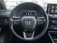 The 2024 Honda Accord Hybrid Touring commands attention in a refined Grey finish that highlights its... (image 8)