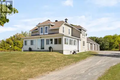 Set on nearly two acres just minutes from Riverside South and the airport, this charming century two...