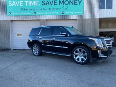 2015 Cadillac Escalade Bold. Black. Beautiful. Turn heads wherever you go with this stunning Black 2...