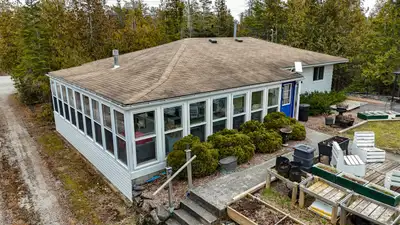Ahh... the sunsets...Soak in the breathtaking views along 100 feet of rocky Lake Huron shoreline, wi...