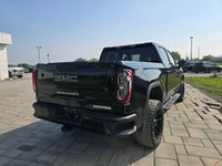 2022 GMC Sierra 1500 Elevation Crew Cab 4x4 with the 2.7L Turbo engine and a bold aftermarket upgrad... (image 4)