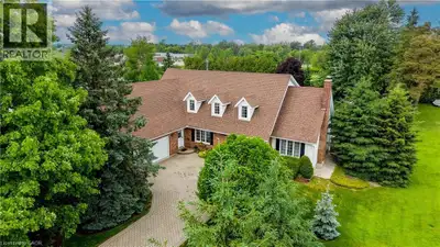 Welcome to 11 Lorraine Drive. Sitting on almost half an acre and offering over 4,000 sq ft of finish...