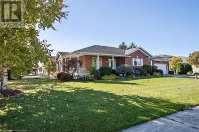 For more info on this property, please click the Brochure button. This custom-built brick home is tu...