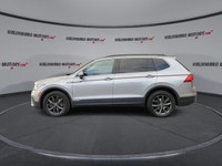 This Volkswagen Tiguan has a dependable Turbo Gas 4cyl 2.0 L engine powering this Automatic transmis... (image 4)
