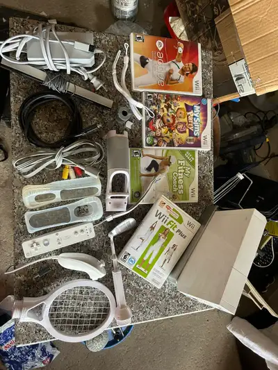  Wii Console with 6 Games, Remotes, Nunchucks & More – $150, View more
