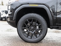 Meet the 2026 GMC Canyon Elevation Crew Cab Short Box 4-Wheel Drive Elevation, a black powerhouse re... (image 5)