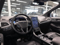 The 2022 Ford Edge ST-Line is a mid-size SUV that combines sporty styling with the practical feature... (image 6)