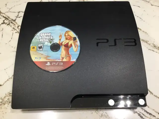 Working Sony PlayStation Slim PS3 (320G) with accessories. $22563871130302211121