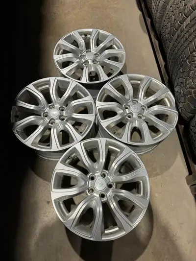 Four LandRover 18 inch 5x108 bolt pattern Aluminum wheels.. In excellent condition All four wheels f...