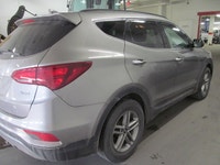 Finished in Silver with a Grey interior, this 2017 Hyundai Santa Fe Sport Base is a practical used S... (image 3)
