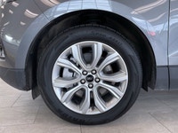 The *2024 Ford Edge Titanium* is a premium midsize SUV that combines confident performance, upscale... (image 7)