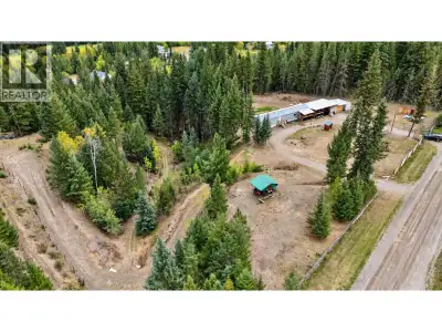Looking for a little country without giving up the convenience of town? This 4.15-acre property migh...