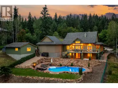 This incredible custom-built home is set on 1.7 private acres in the exclusive Whisper Ridge communi...