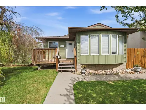 FULLY DEVELOPED 4-level split in west Edmonton combining extensive interior updates with an exceptio...