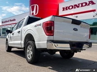 Unleash the power and capability of this 2022 Ford F-150 Crew Cab Pickup. This robust truck boasts a... (image 3)