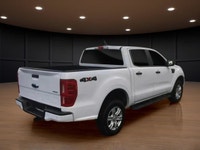 Experience the power of a 2019 Ford Ranger XLT in a crisp white finish, equipped with a robust 4x4 d... (image 5)