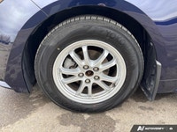 This Toyota Corolla delivers a Gas/Electric I-4 1.8 L/110 engine powering this Variable transmission... (image 8)